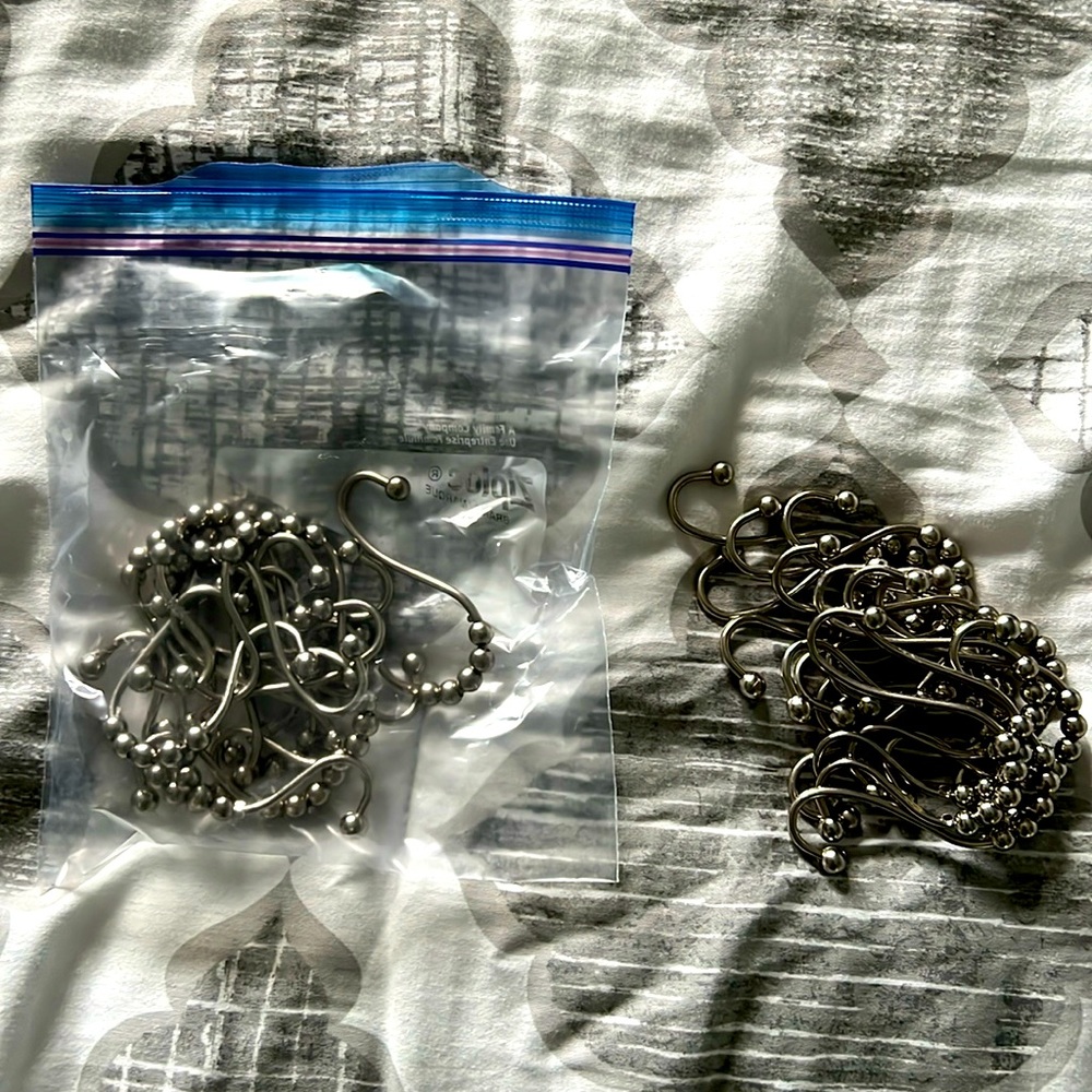 2 sets of shower curtain rings